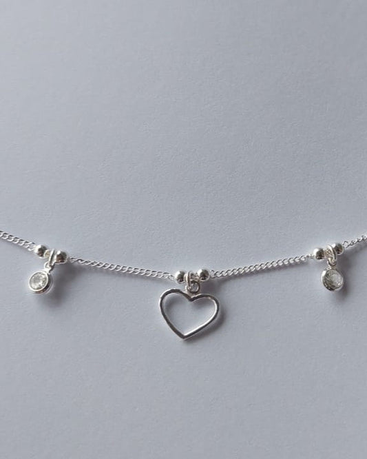 Pulsera grumet con corazón y puntos de luz