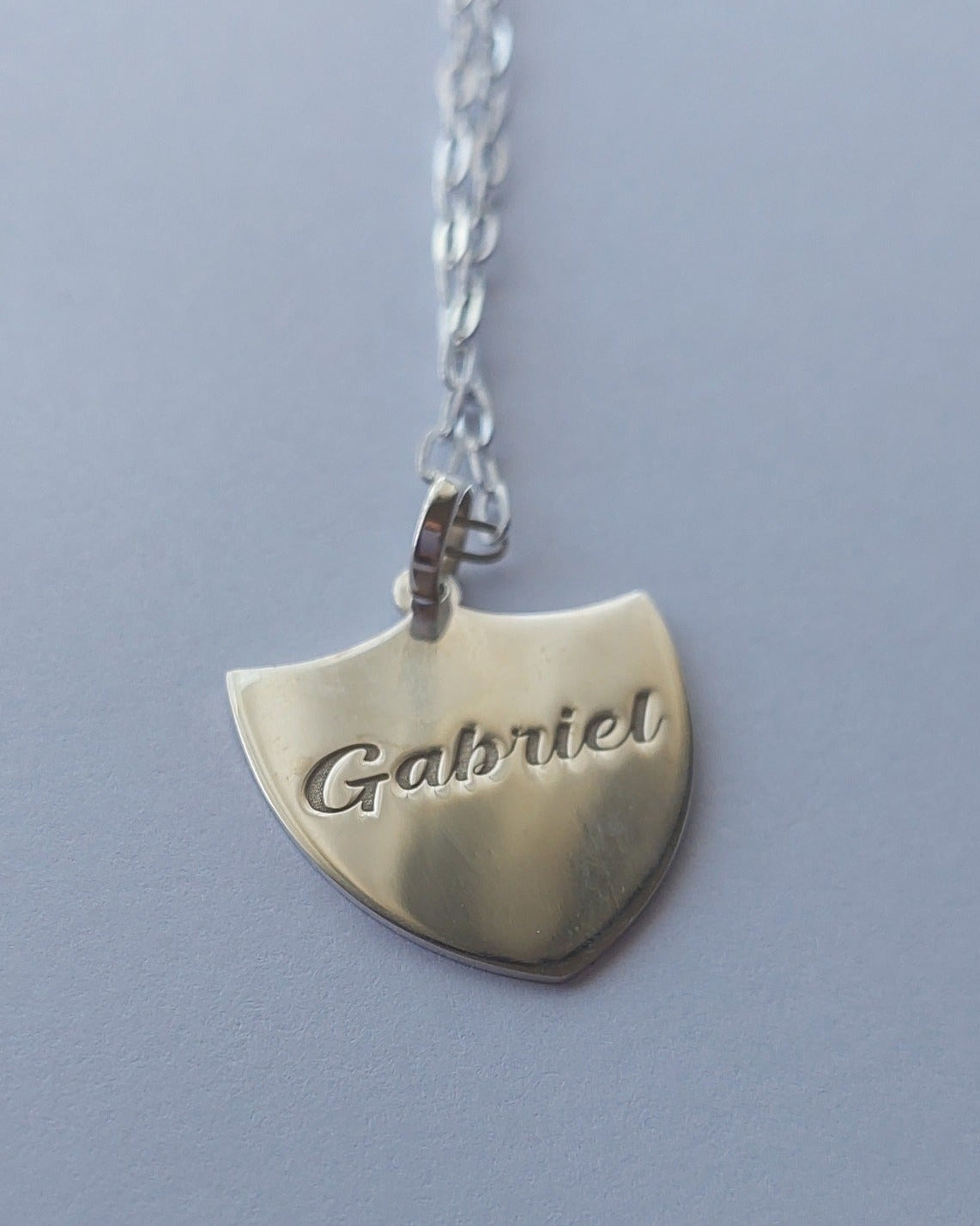 Cadena con dije y escudo nacional