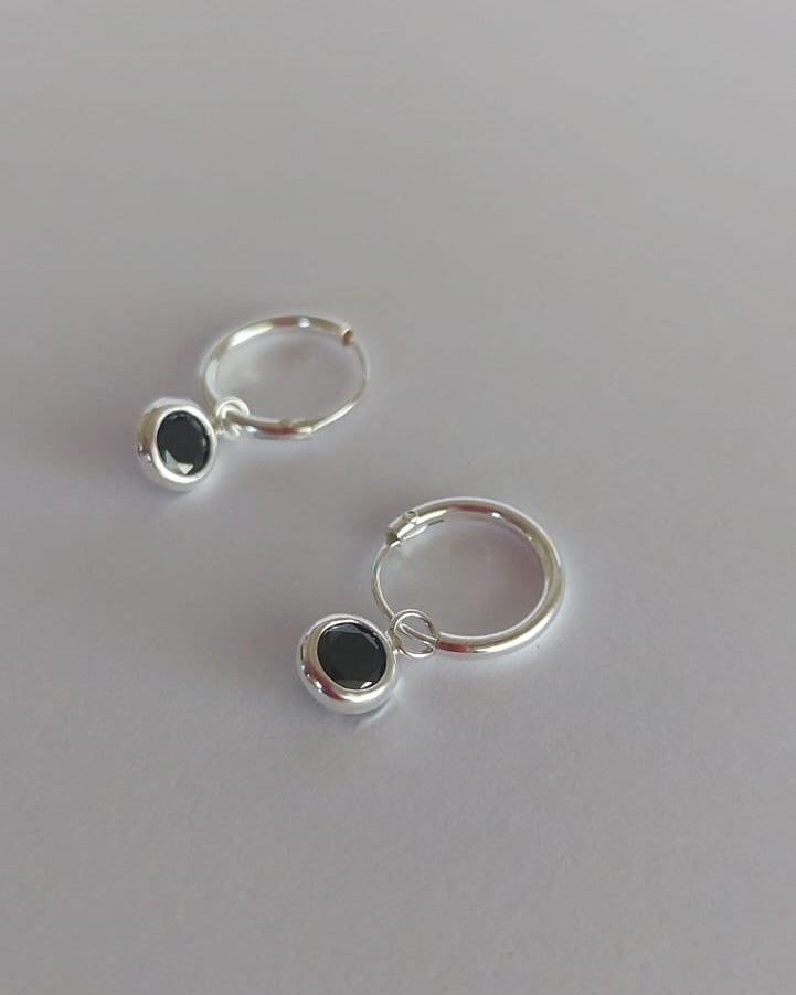 Aros con puntos de luz negro