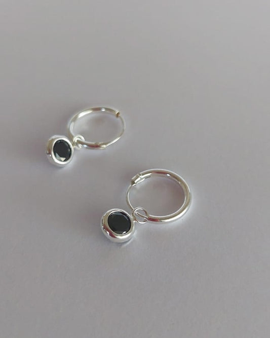 Aros con puntos de luz negro